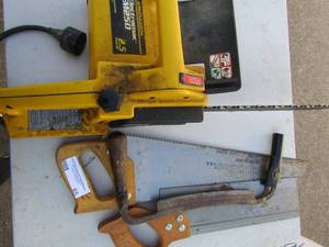 lot 65 image: McCluoch electric chain saw and 3 hand saws