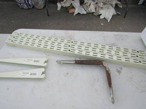 lot 107 image: White box full of shelving brackets and connectors