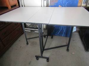 lot 134 image: white fold up art table good condition  35x69x36 open  35x12x36 closed
