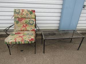 lot 135 image: black metal outdoor chair with cushion 29x29x25 and table metal 16x36x15