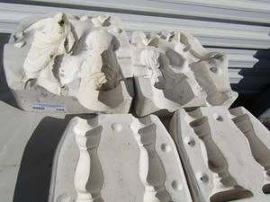 lot 188 image: molds-small dress bookends and lady figurines