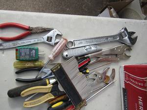 lot 210 image: Box of tools- screwdrivers, plyers, needle nose, wire cutters and more