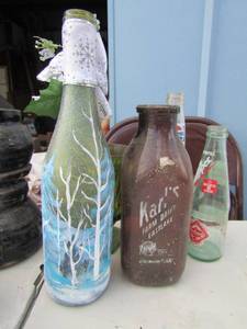 lot 225 image: Karls farm dairy milk bottle, Decorative wine bottles, Pepsi bottle, dr. pepper bottle