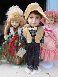 lot 245 image: 3 Cathay dolls collections 2 girls 1 boy all 16 on stands