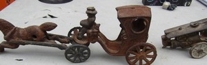 lot 282 image: Cast iron  horse and carriage and other cast iron pieces