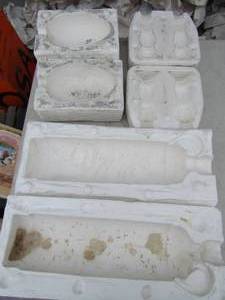 lot 291 image: Dragon vase  19 X 7 Molds-  2, candle sticks and egg