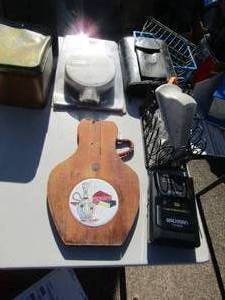 lot 307 image: Tin can with lid, Sony pocket radio, cheese board, black notebook keeper, NEW kiddie smoke alarm
