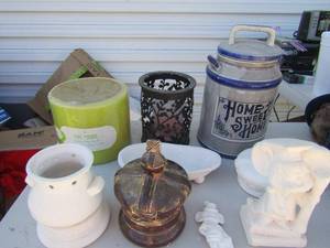 lot 318 image: Ceramic pieces- candle holder, pillar candle, jug home sweet home