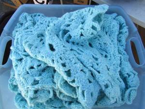 lot 340 image: Large blue knitted blanketthrow