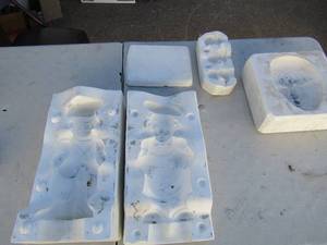 lot 420 image: Molds- Chef caddy and doll heads