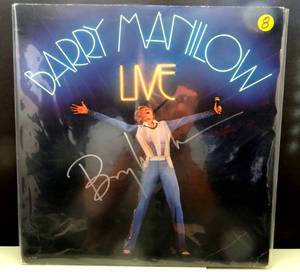 lot 8 image: BARRY MANILOW LIVE - HAND SIGNED AUTOGRAPHED ALBUM IN SILVER SHARPIE - $$$$