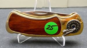 lot 25 image: BEAUTIFUL FLIP OUT KNIFE WITH BRASS & WOOD HANDLE