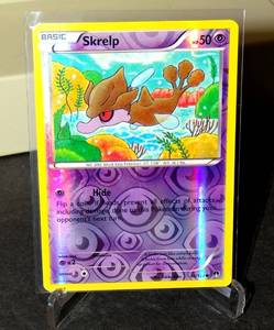 lot 44 image: SKRELP HOLO POKEMON CARD - 63122