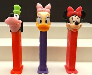 lot 210 image: VINTAGEDISNEY THEMED PEZ DISPENSERS - GOOFY, DAISY, AND MINNIE