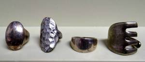 lot 241 image: COLLECTION OF HAND FORGED RINGS - SOUND LIKE SILVER (NO MARKINGS)