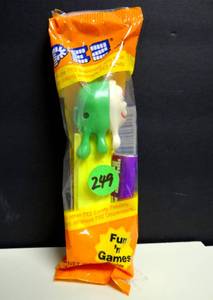 lot 249 image: Pez Slimy Sid Ghost With Glow In The Dark Face, Yellow Stem, Pez Candy Dispenser - UNOPENEDMINT