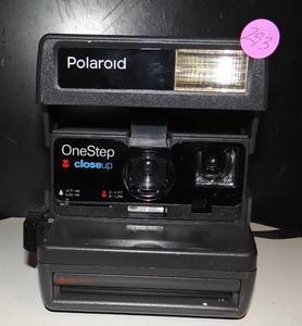 lot 293 image: VINTAGE Polaroid One Step Close Up Instant Camera $$