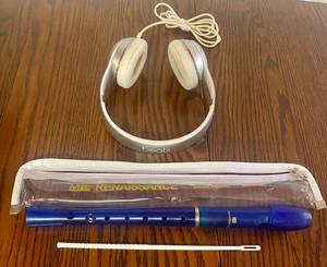lot 153 image: ME Renaissance Soprano Recorder and White Beats Headphones
