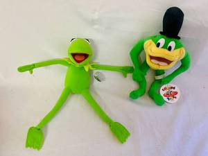 lot 175 image: Muppeets Kermit Frog lush and Looney Tunes Michigan J. Frog Plush 1996