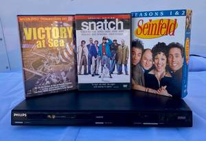 lot 25 image: Phillips DVD Player model DVP3962137 Sinefeld Seasons 1 &2, Snatch Victory Sea