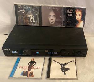 lot 74 image: Sony CDDVD Player Model No DVP-NS300 and 5 CDs