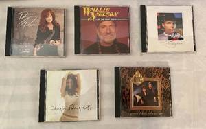 lot 75 image: CDs - Garth Brooks, Willie Nelson, Bonnie Rait, Shania Twain and the Judds