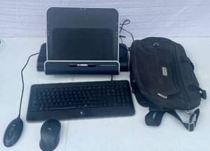 lot 111 image: HP x6 2000 Notebook Expansion Base along wlogitech Keyboard, Wired Mouse wireless mouse Departure Computer Bag