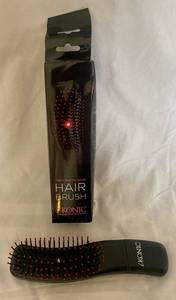 lot 116 image: Ikonic Vibrating Massage Hairbrush