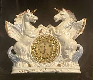 lot 120 image: Vintage Porcelain Pegasus Unicorn Quartz Mantle Clock