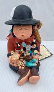lot 19 image: Chief Storyteller by Sandy Whitefeather Figurine