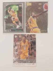 lot 34 image: Selection of 3 Kobe Bryant basketball cards