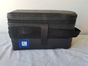 lot 104 image: GM Performance Parts - Tire Sealant and inflator kit