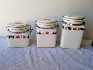 lot 154 image: Set of 3 sealed Coca Cola cannisters