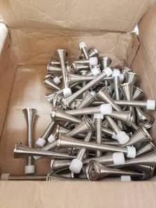 lot 323 image: Selection of spring door stoppers