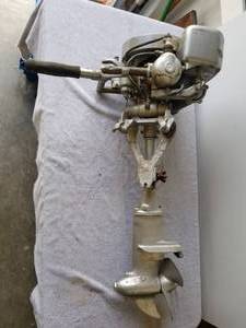 lot 305 image: 1929 A-45 3 HP Johnson outboard motor