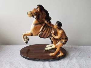 lot 172 image: Ceramic Horse and Rider on wood base