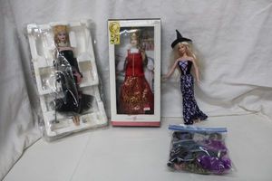 lot 25 image: Halloween Barbie with Clothes, Princess of Imperial Russia Doll, and Solo in the Spotlight of 1961 Doll (Still in Packaging)