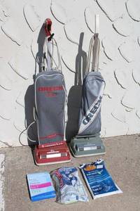 lot 23 image: Two Oreck XL Vacuum Cleaners and Replacement Filters