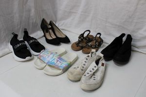 lot 105 image: Womens Shoes Size 7.5 - Nine West, Patrizia, Calvin Klein, Vans, and Blowfish Malibu