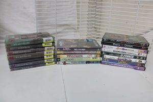 lot 136 image: DVDs Sex and the City seasons, Disney Movies and Some Unopened DVDs