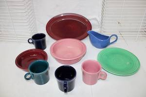 lot 173 image: Fiesta Dishes Mugs, Bowl, Plate and Oval Platter (Gravy Boat marked Japan)