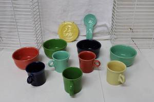 lot 174 image: Fiesta Dishes Mugs and Bowls Plus Decorative Plate and Ladle Holder