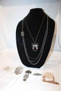 lot 377 image: 1970s style jewelry. Includes owl character necklaces, fish pendant plus
