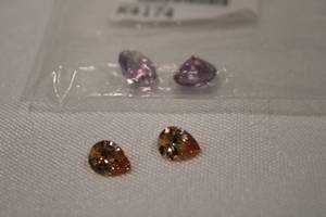 lot 370 image: (2) Pairs of matched loose gemstones. 10mm Amethyst rounds (3.5 carats each) and 11 x 7 mm Citrine pear shape (2.25 carat each).