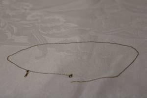 lot 369 image: 10K yellow gold 18L chain. Marked 10K One clasp needs reattached but is included.