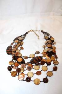 lot 384 image: Chicos branded tortoise shell style multi strand necklace w Chicos hang tag. 18L w 2 extender