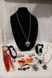 lot 375 image: Halloween themed jewelry. Includes necklaces, earrings, chokers, faux hair, skeletons plus
