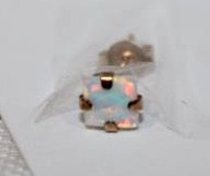 lot 399 image: 10K yellow gold single opal post earring. Marked 10K butterfly back