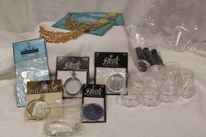 lot 405 image: Findings, carded glass lockets, steampunk locket and round bead organizers, garnets. Generous quantity