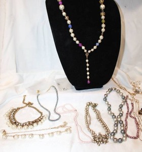 lot 397 image: Pearl and simulated pearl jewelry. Includes necklaces, earrings and more